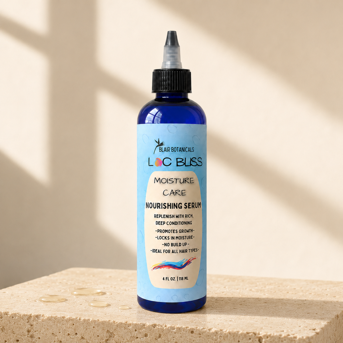 Blair Botanicals Loc Bliss 4 oz Nourishing Serum bottle in warm natural light.