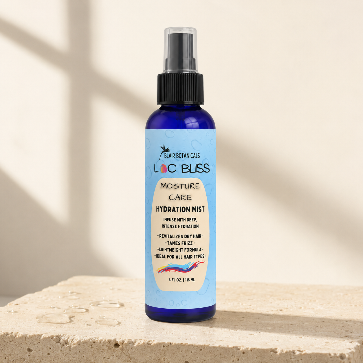 Blair Botanicals Loc Bliss 4 oz Hydration Mist bottle in warm natural light.