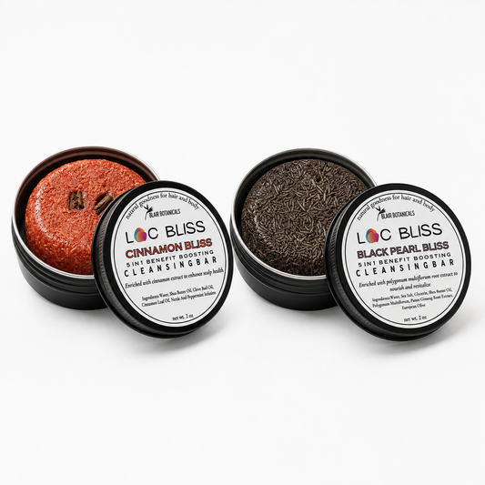 Cinnamon Bliss and Black Pearl Bliss 2 oz Loc Bliss shampoo bars in open black tins on a white background.