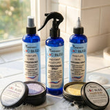 LOC Bliss hair care products on a bathroom counter with a window in the background.
